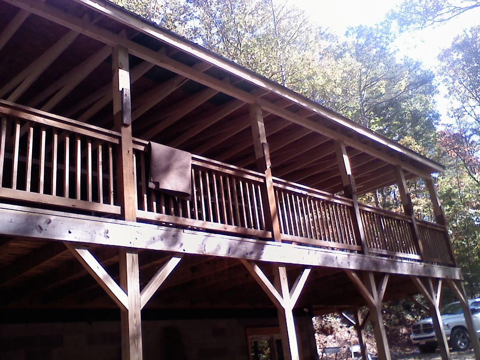 Timber framing under a new elevated porch and deck — Roof Leak Repair in Francisco by Roofing Brothers